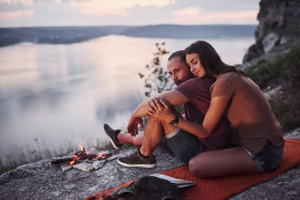 A couple resting after a hike