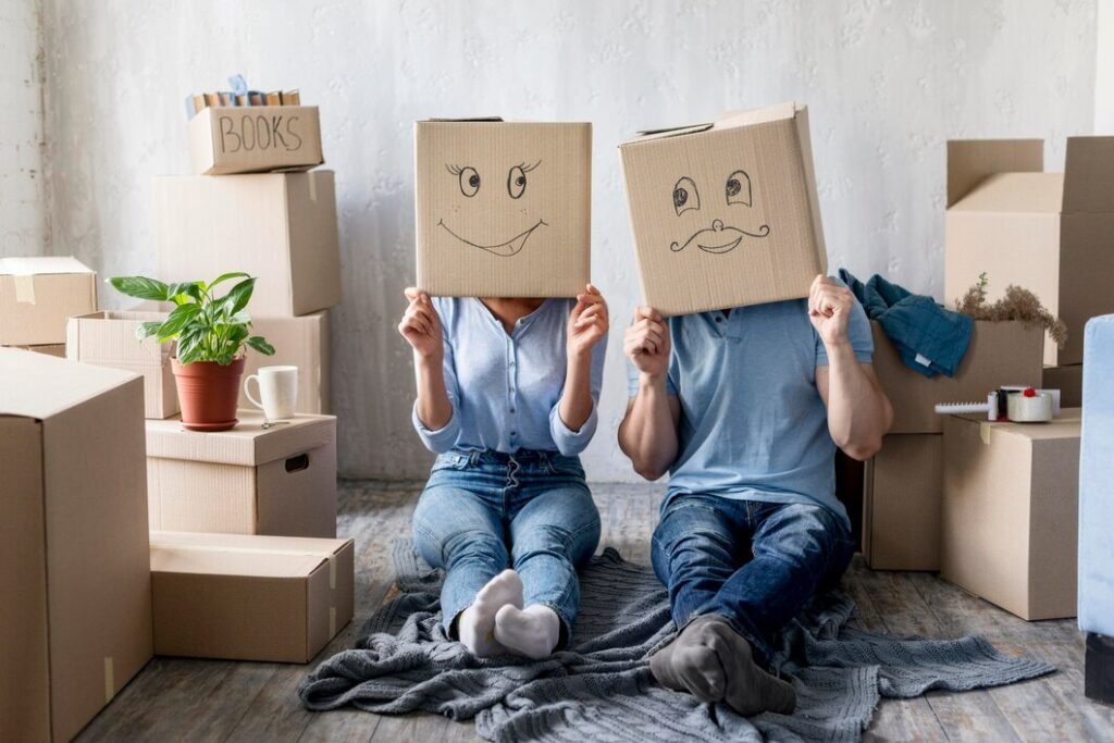 Newly moved in couple having fun