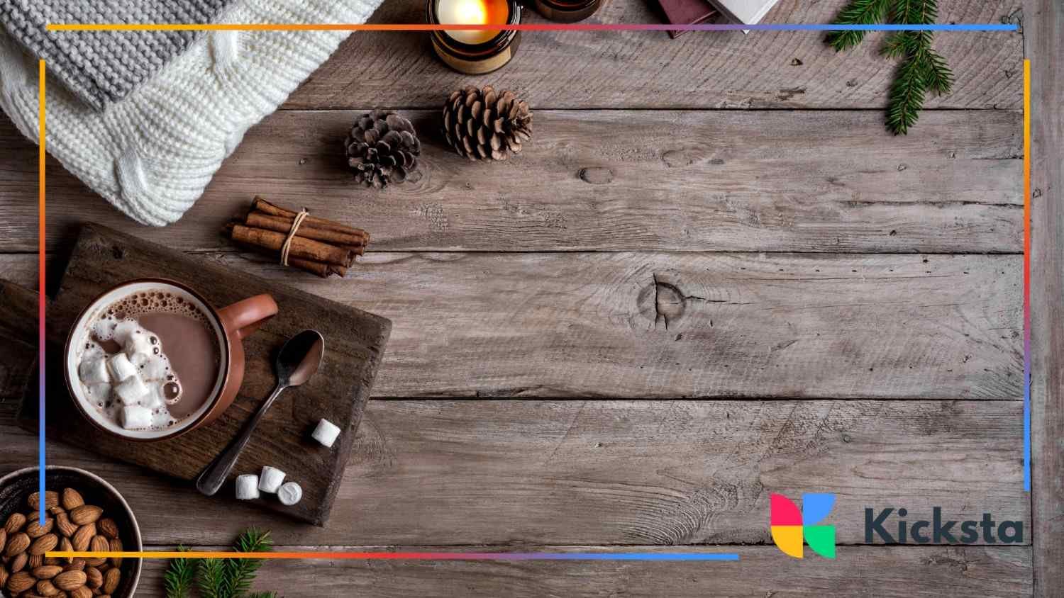 A rustic wooden table with hot cocoa, cinnamon sticks, and cozy knits, perfect for a warm, winter-themed brunch moment