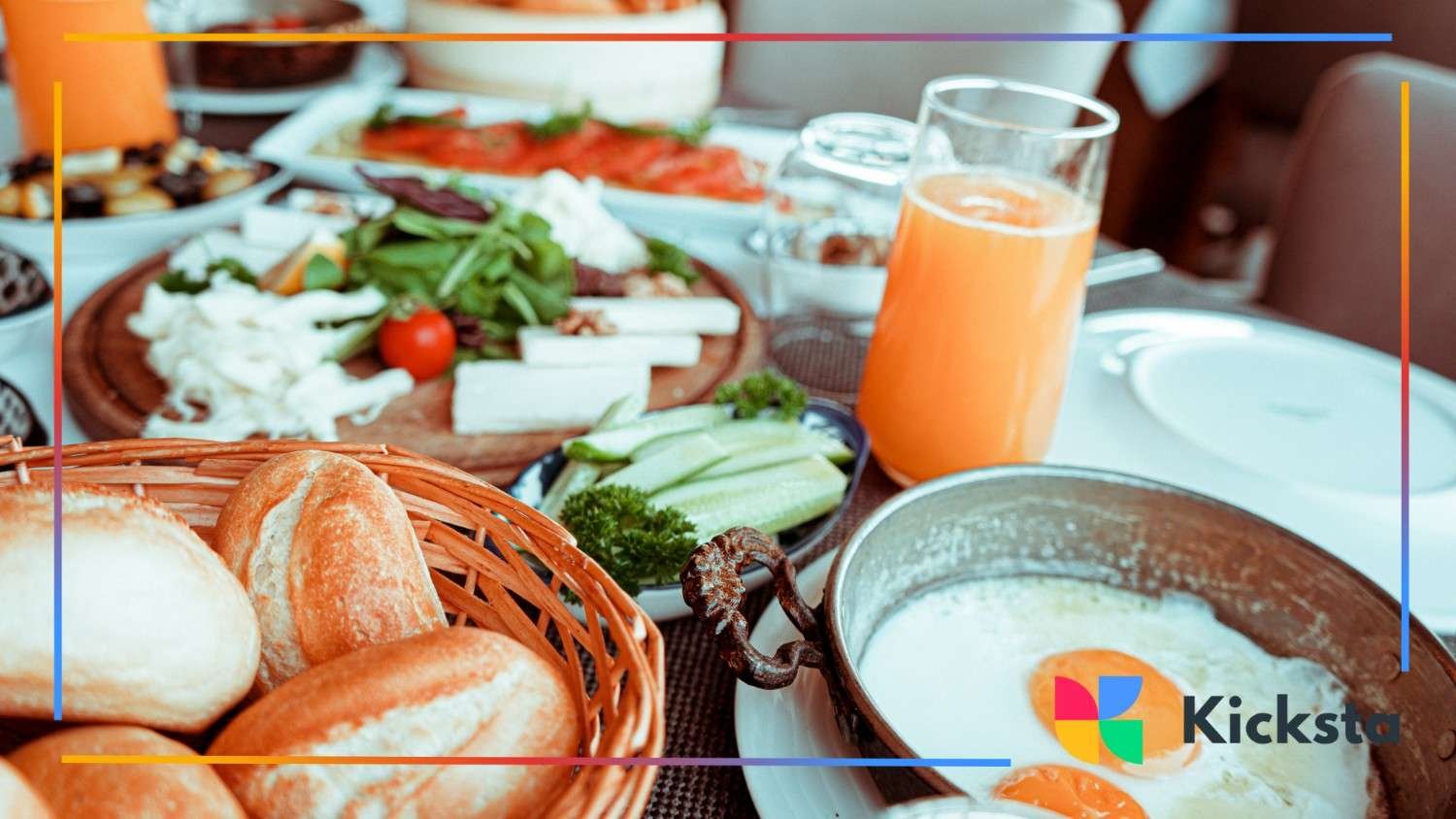 A close-up of a wholesome brunch setup featuring fresh bread, veggies, juice, and sunny-side-up eggs