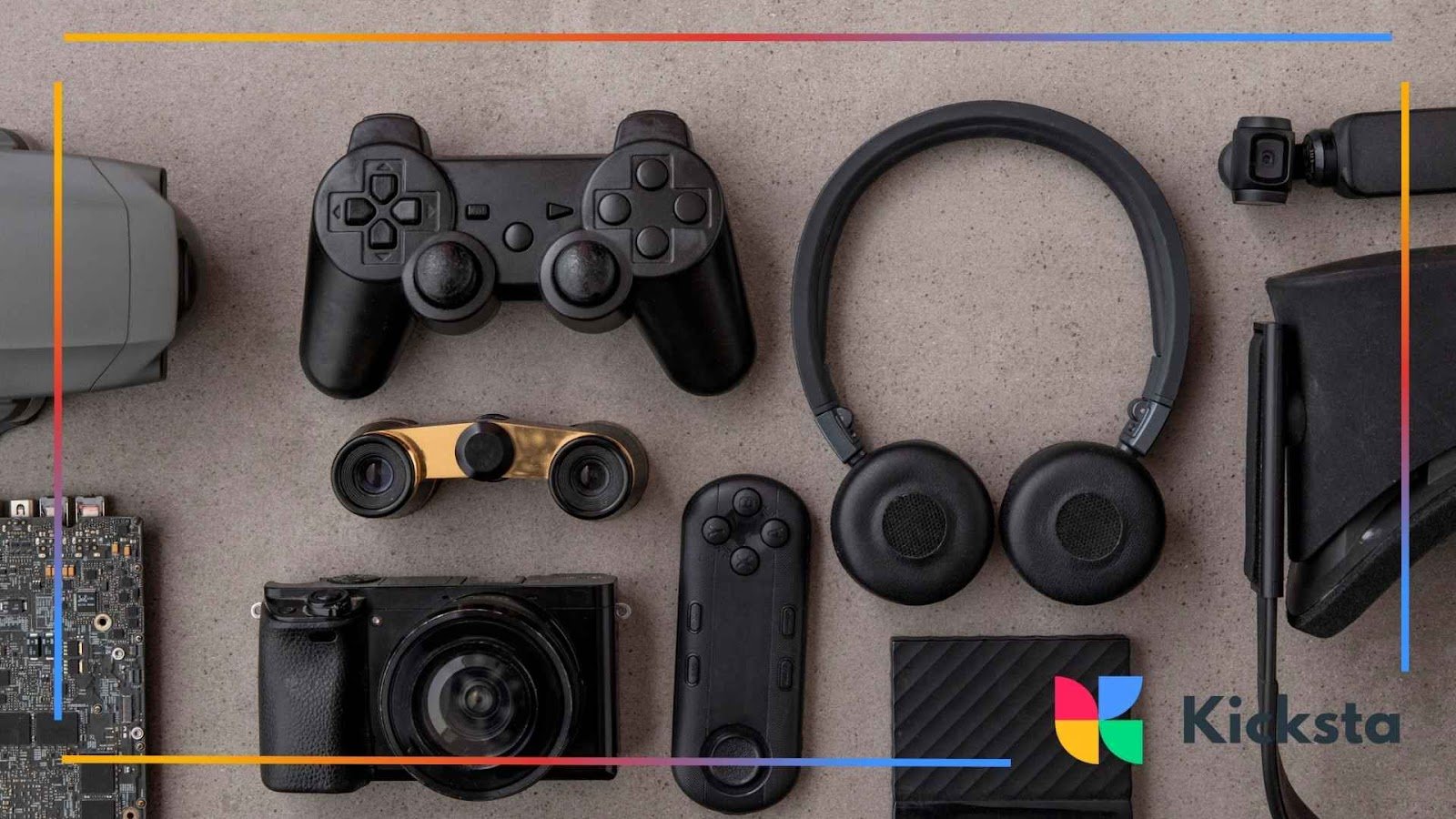 Flat lay of modern gadgets including gaming controller, headphones, camera, and tech accessories, symbolizing digital lifestyle and influencer gear.