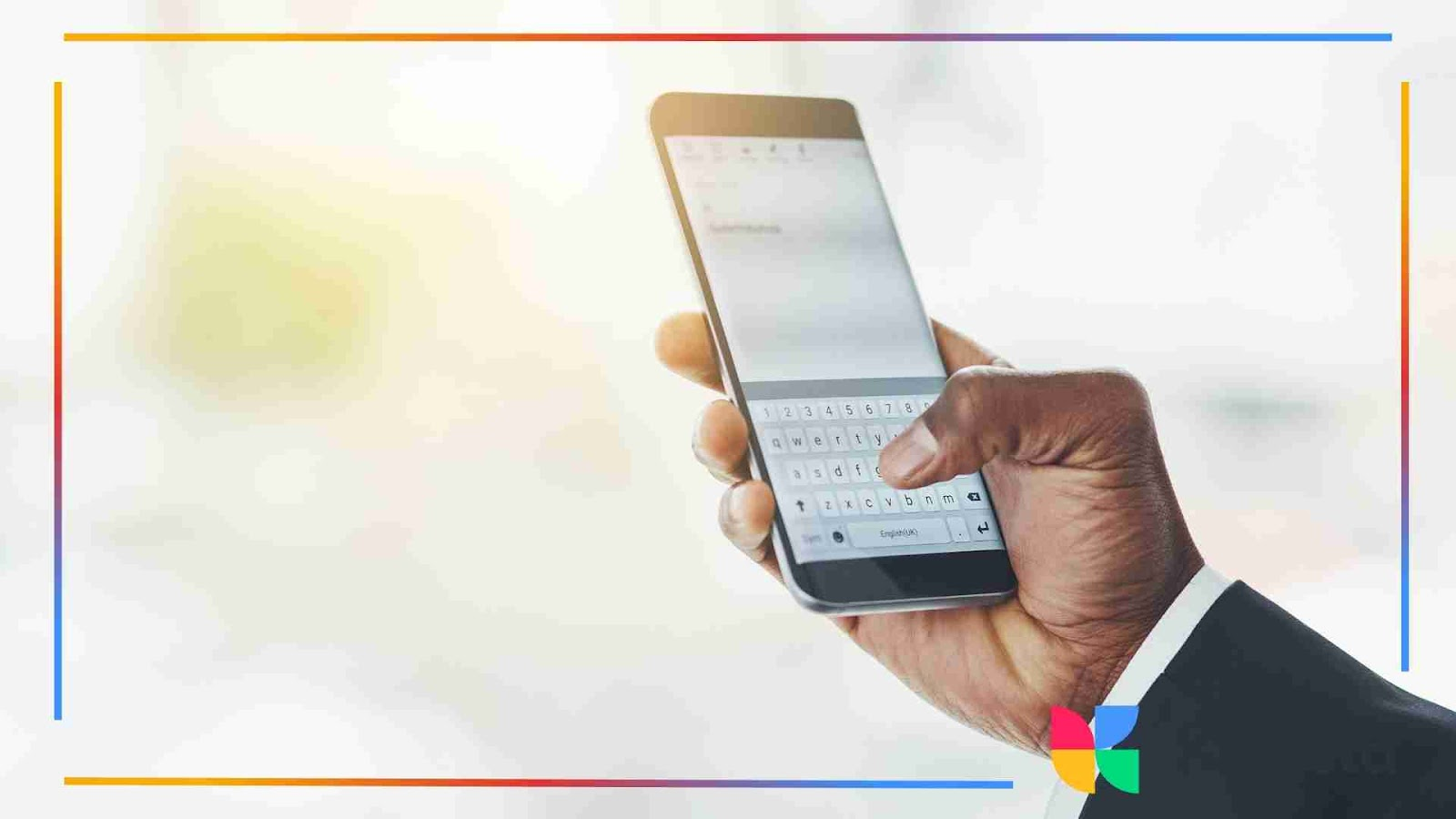 Hand typing on a smartphone to reply to Instagram comments.