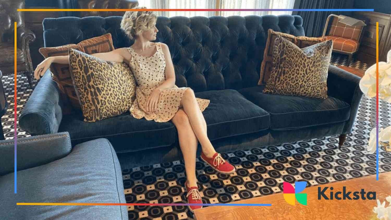 classy woman sitting on the coach