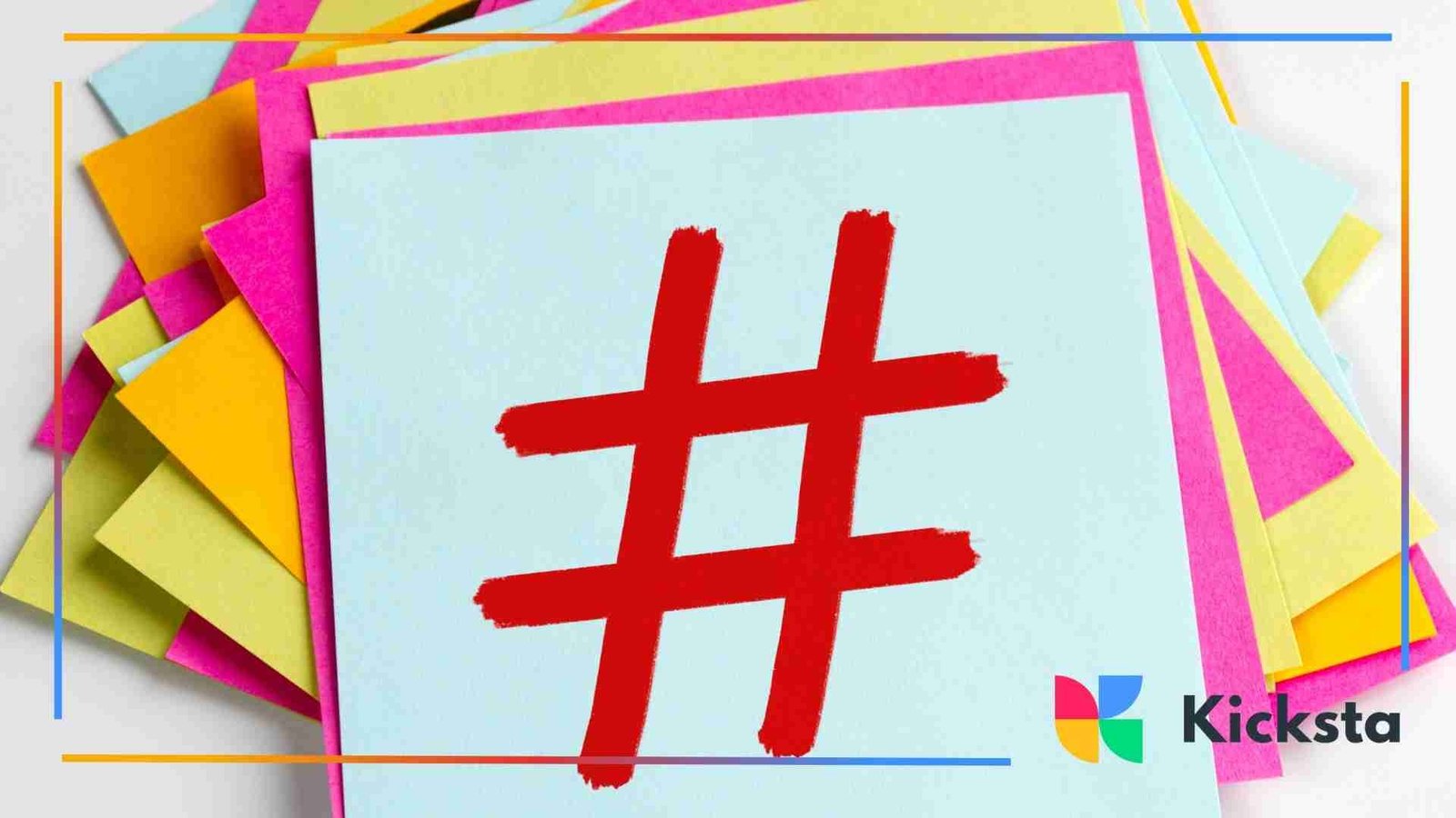 A bright red hashtag symbol drawn on a blue sticky note placed on top of a stack of colorful sticky notes.