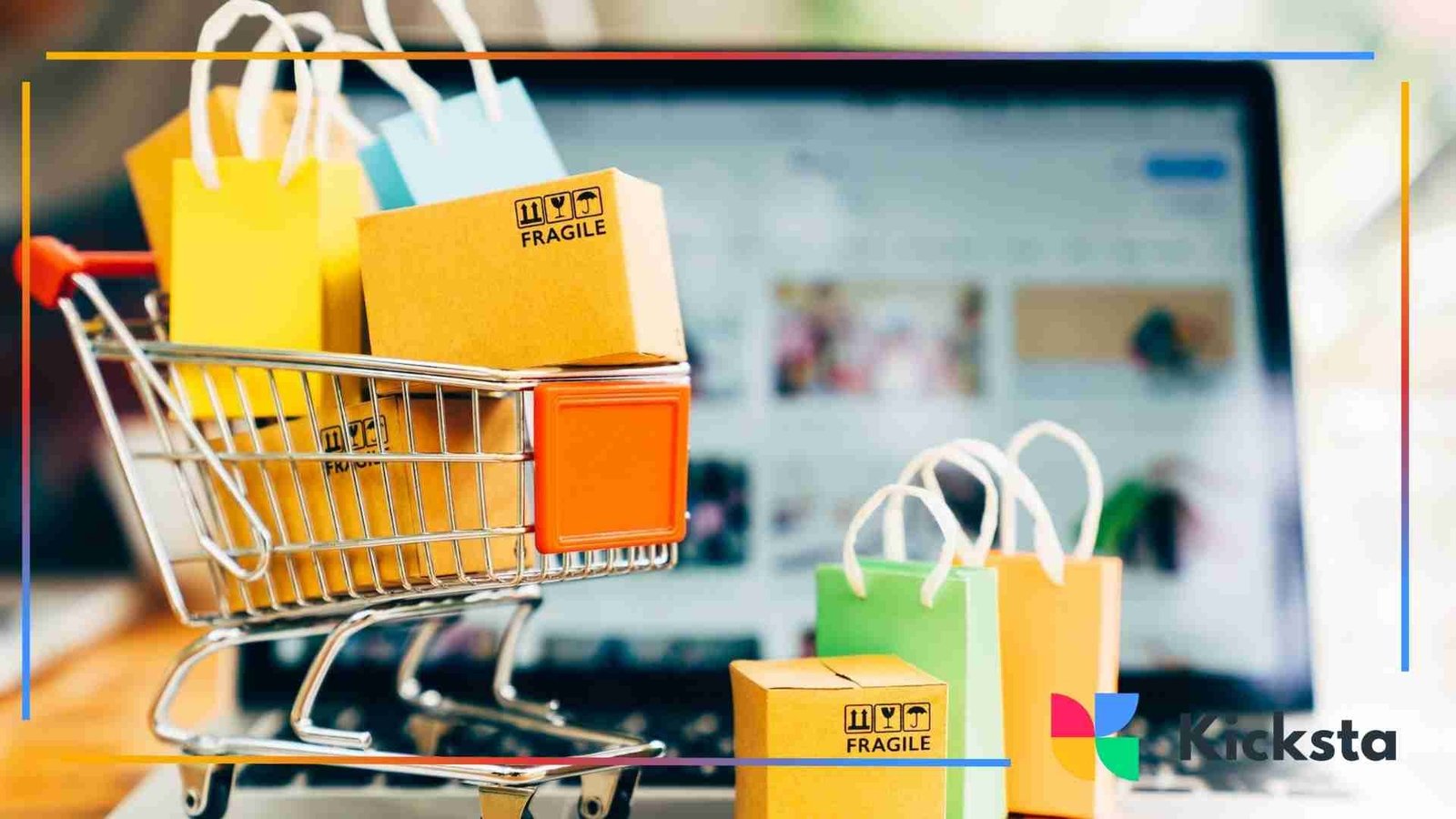 Mini shopping cart filled with colorful gift bags placed on a laptop, representing online shopping.