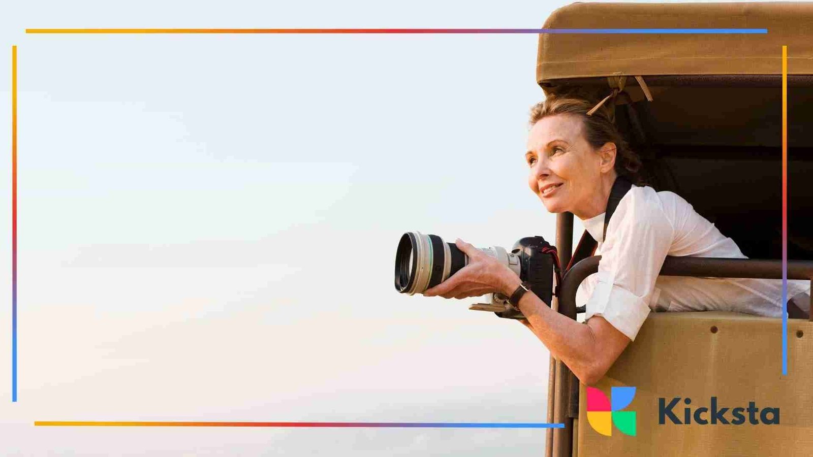 A woman leaning out of a safari vehicle holding a large camera lens, aiming at scenery during golden hour.