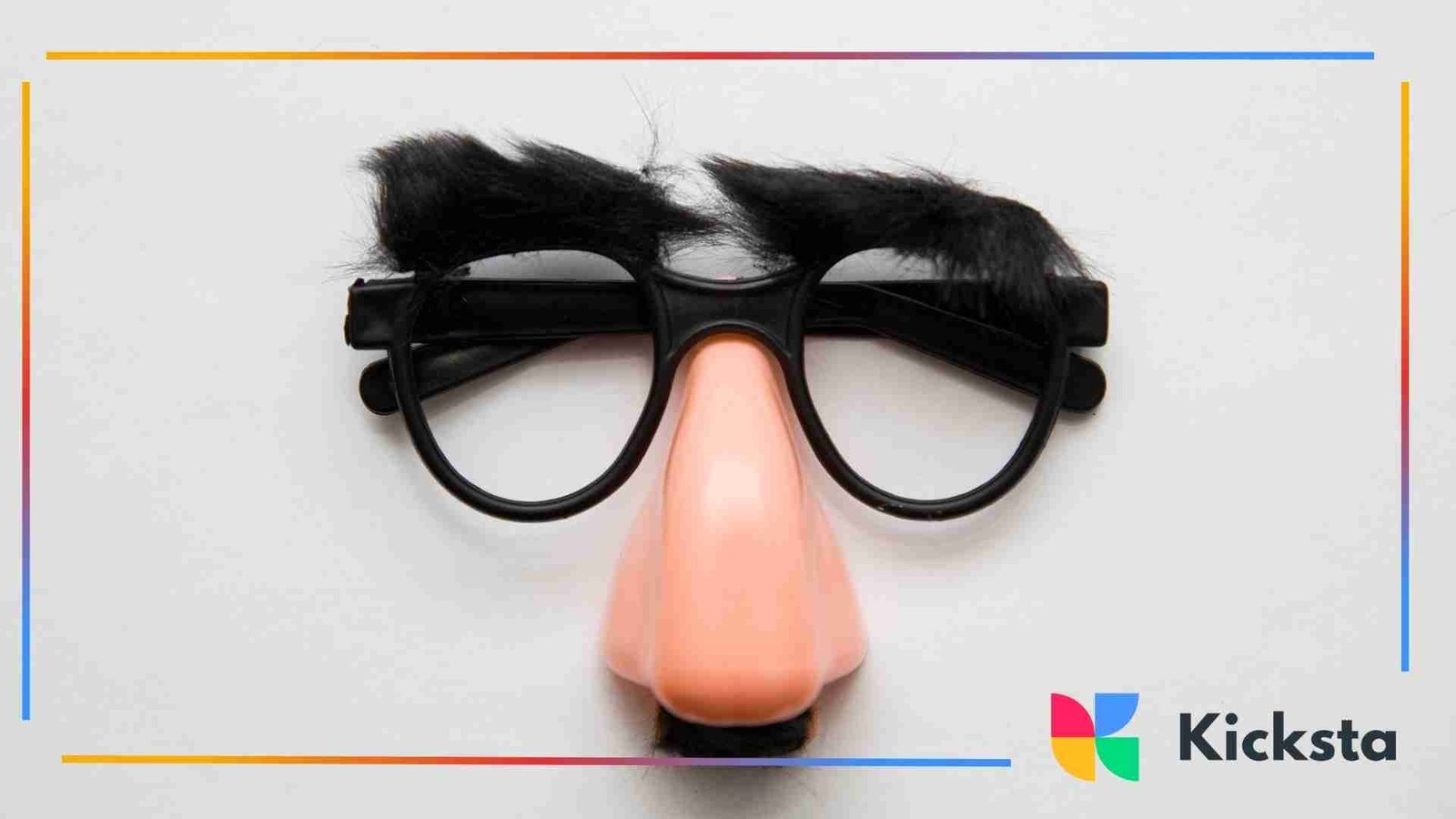 Disguise glasses with fake eyebrows, nose, and mustache laid flat on a light background.