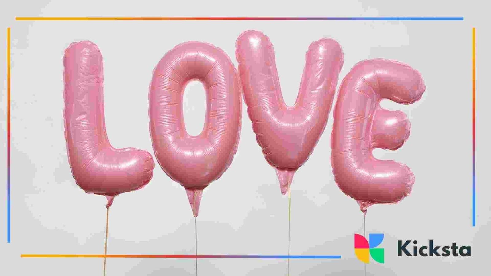 Pink balloon letters spelling the word “LOVE” against a light background.